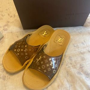 Vintage Louis Vuitton pool slides